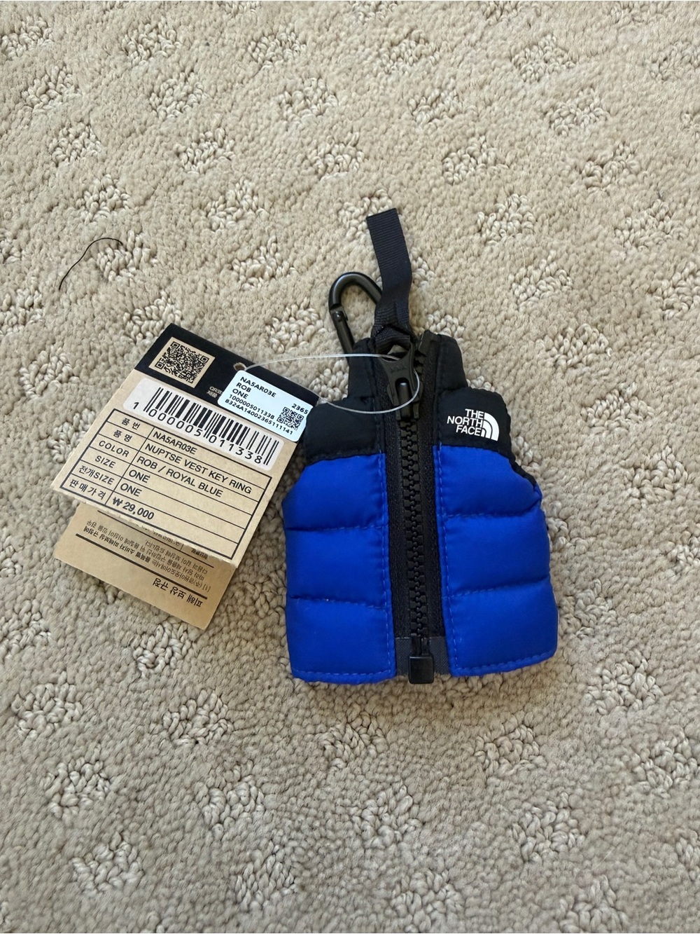 The North Face Blue Mini Puffer Vest Keychain